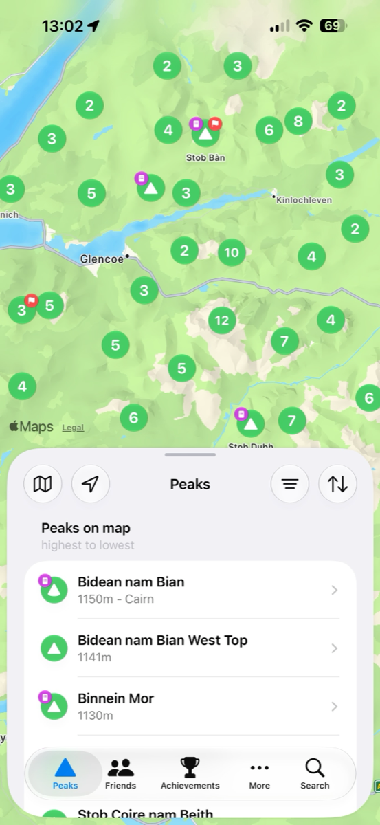 Peaking's peak-discovery map over Glencoe, with green clustered pins and a list of the highest summits nearby.